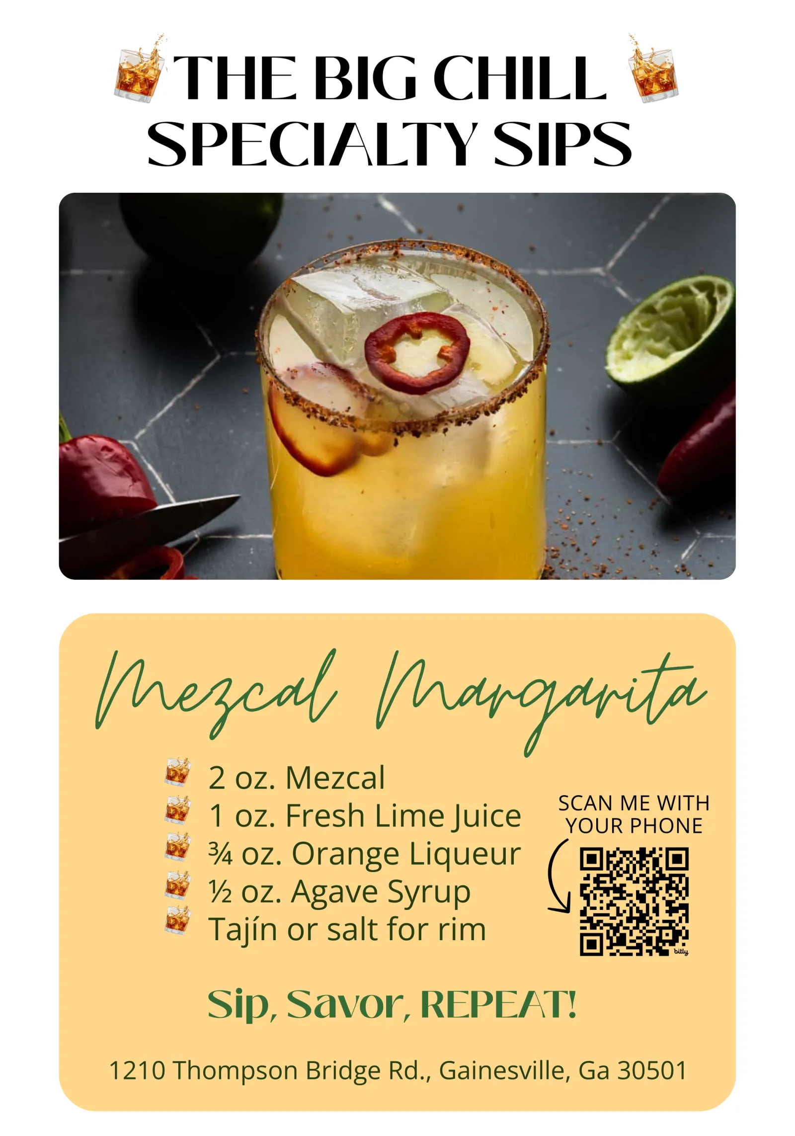 Mezcal margarita cocktail with chili garnish, ice cubes, and Tajín-rimmed glass on dark surface.
