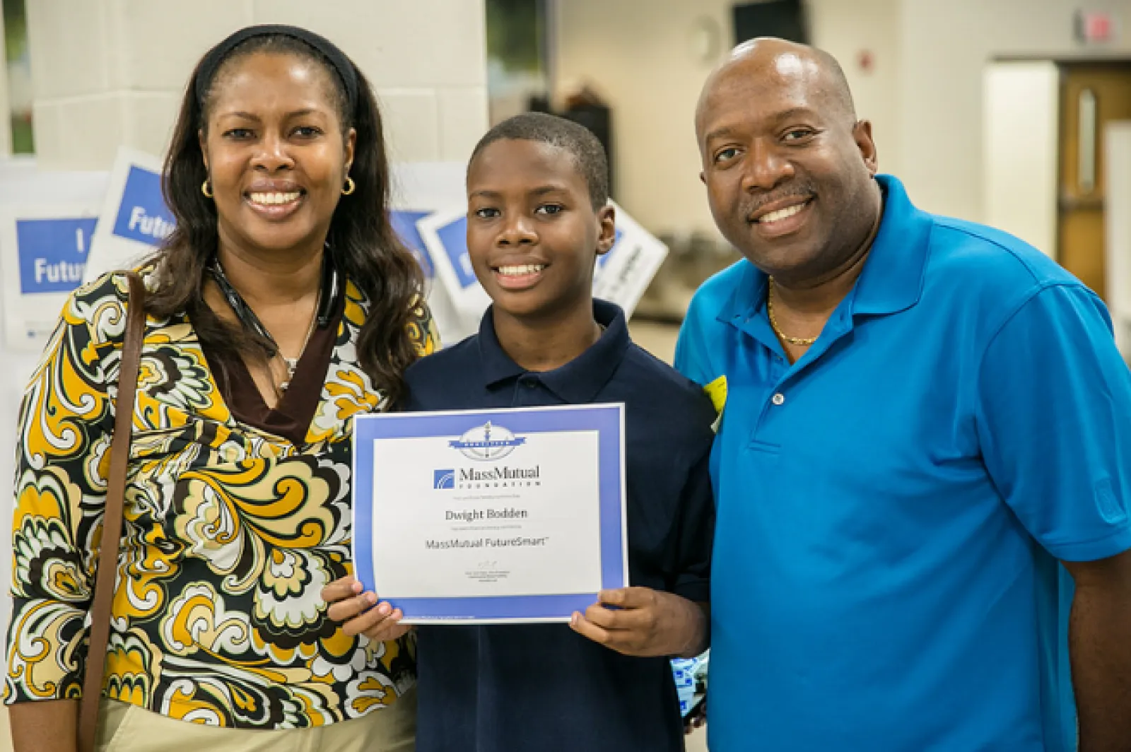 a group of people holding a certificate