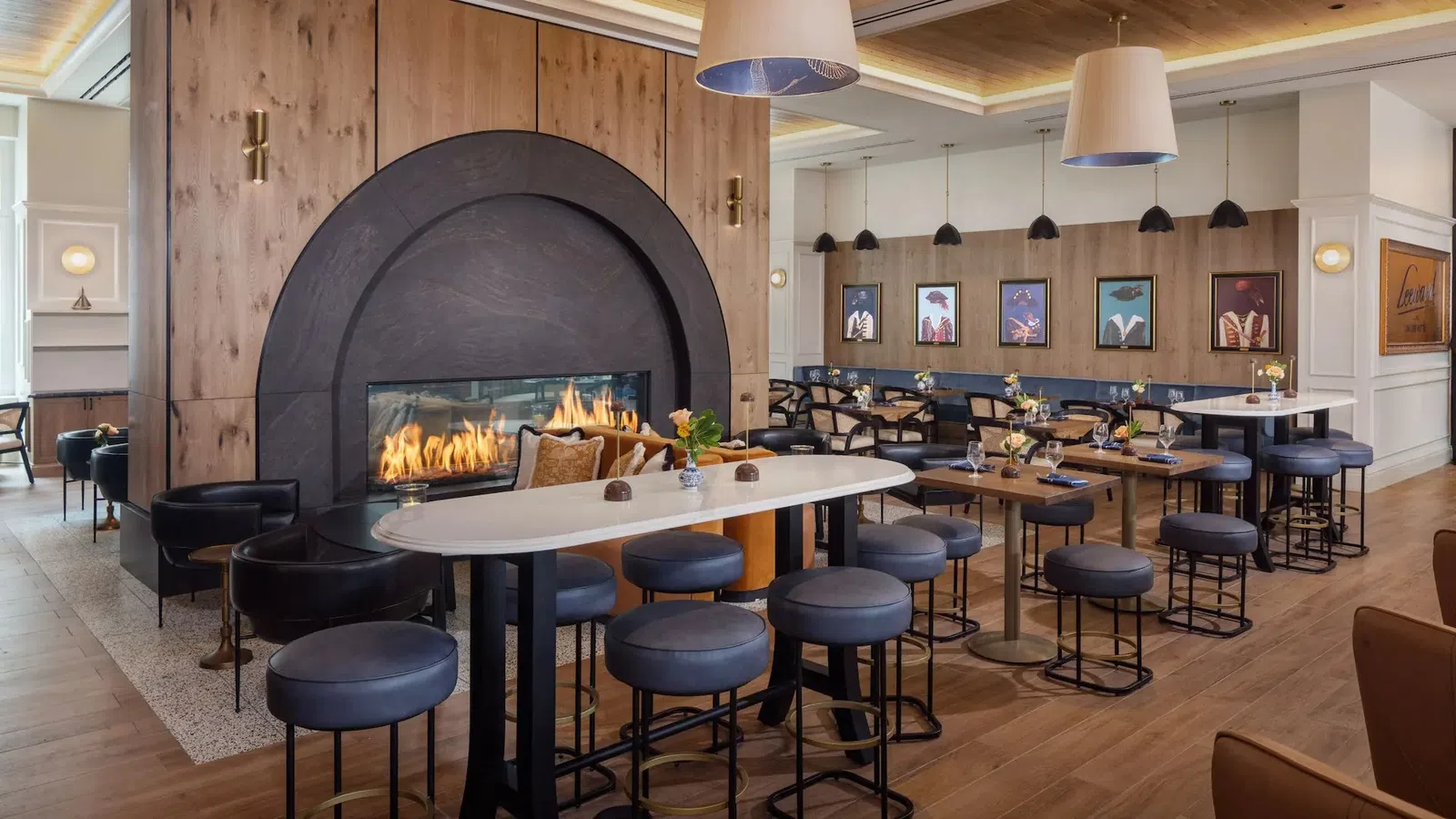 The Lowline by Hyatt JDV Custom Millwork Including Tongue-and-Groove Ceiling, Stained Wood Paneling, and Stone Fire Surround Stone