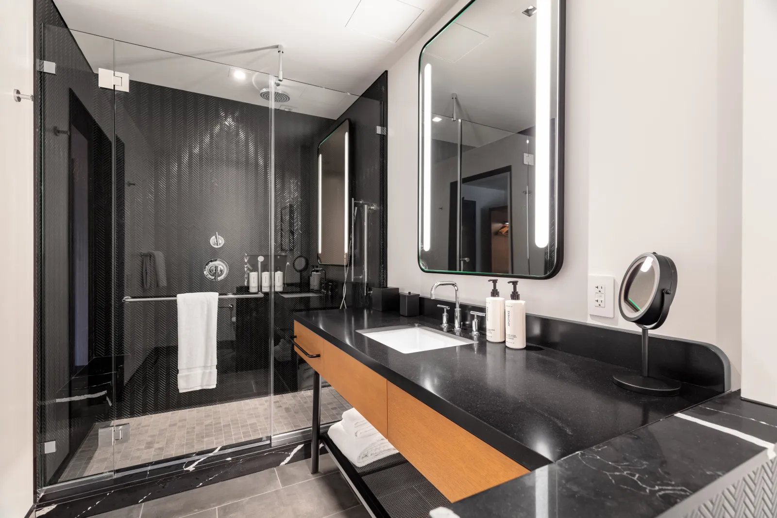 Homewood Suites & Canopy by Hilton Custom Shower Surround and Pan, Glass Door, Vanity Millwork and Countertop