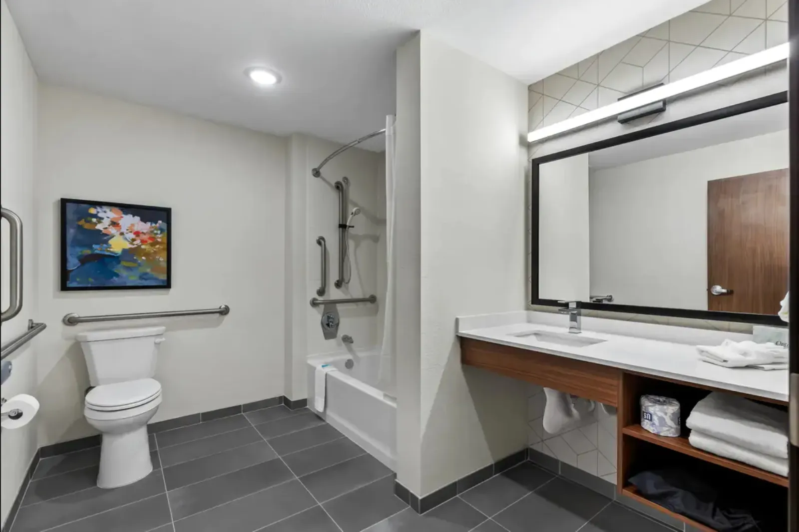 Everhome Suites by Choice Custom Bath Shower Surround, Quartz, and Cabinetry