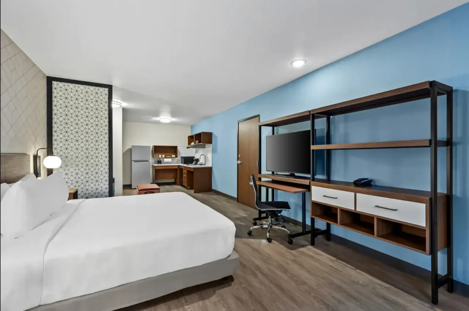 Everhome Suites by Choice Custom Casework and Bedroom Acrylic Divider