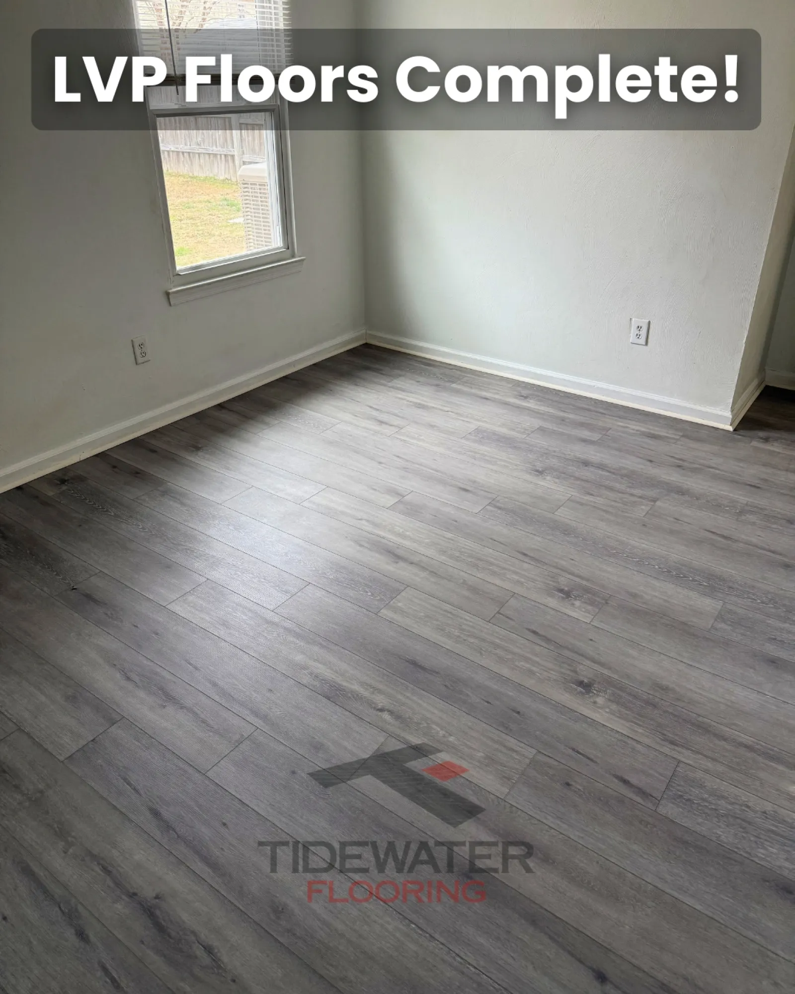 Stylish LVP flooring completed in a light-filled room, highlighting modern home interior design.