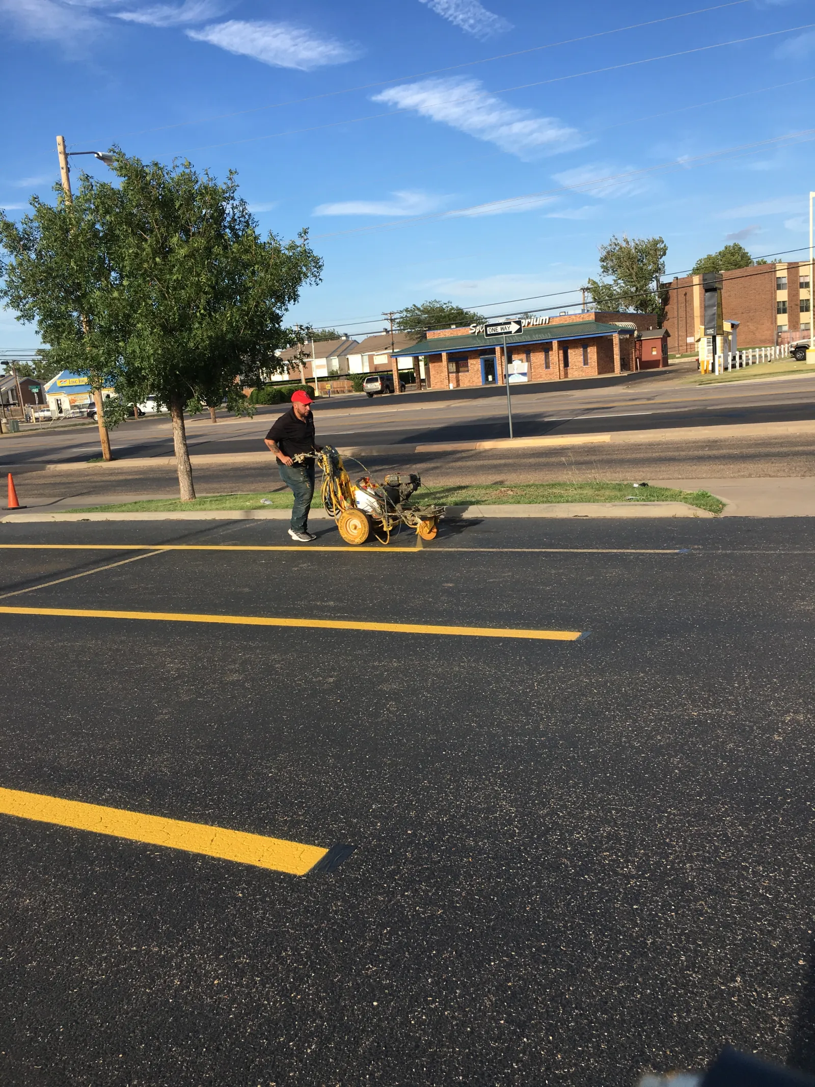 a person pushing a moped