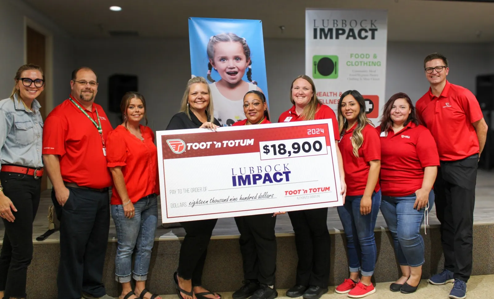 a group of people holding a sign