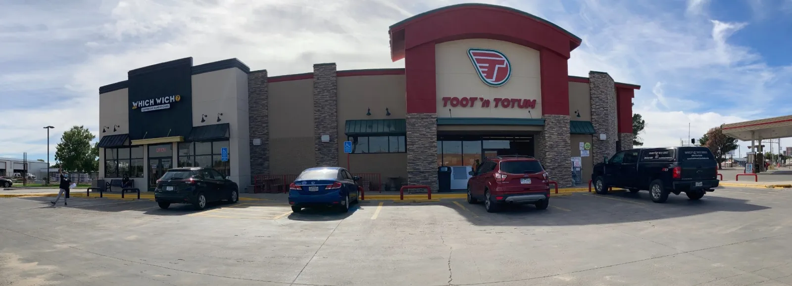 a group of cars parked outside a building