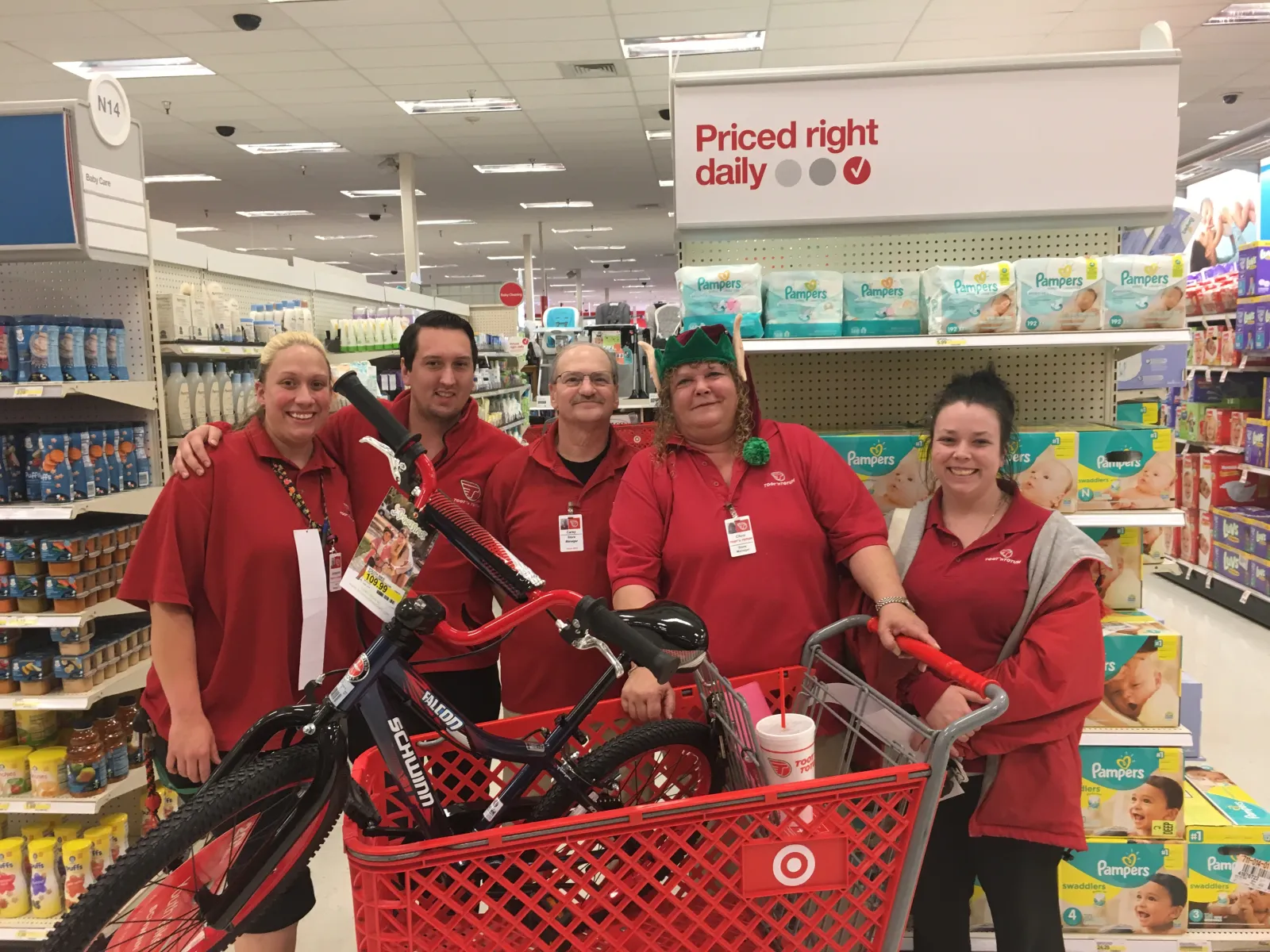 a group of people standing in front of a store