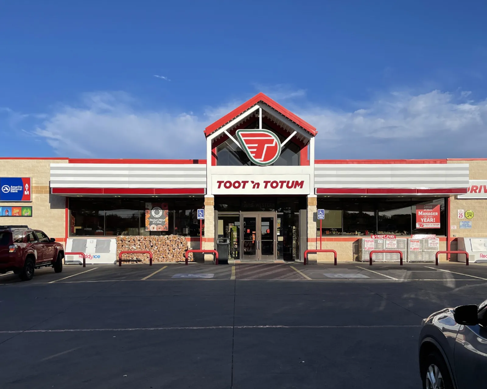 a store front with a red sign