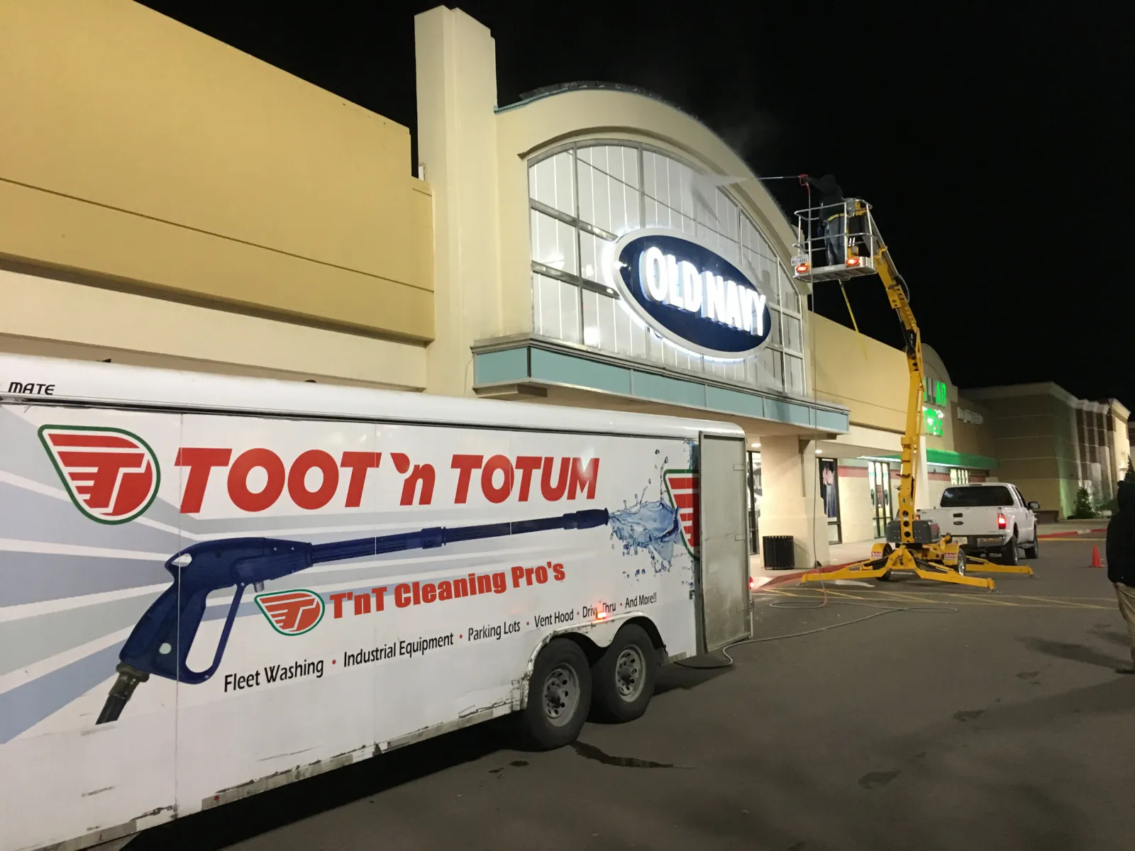 a white truck parked outside a building