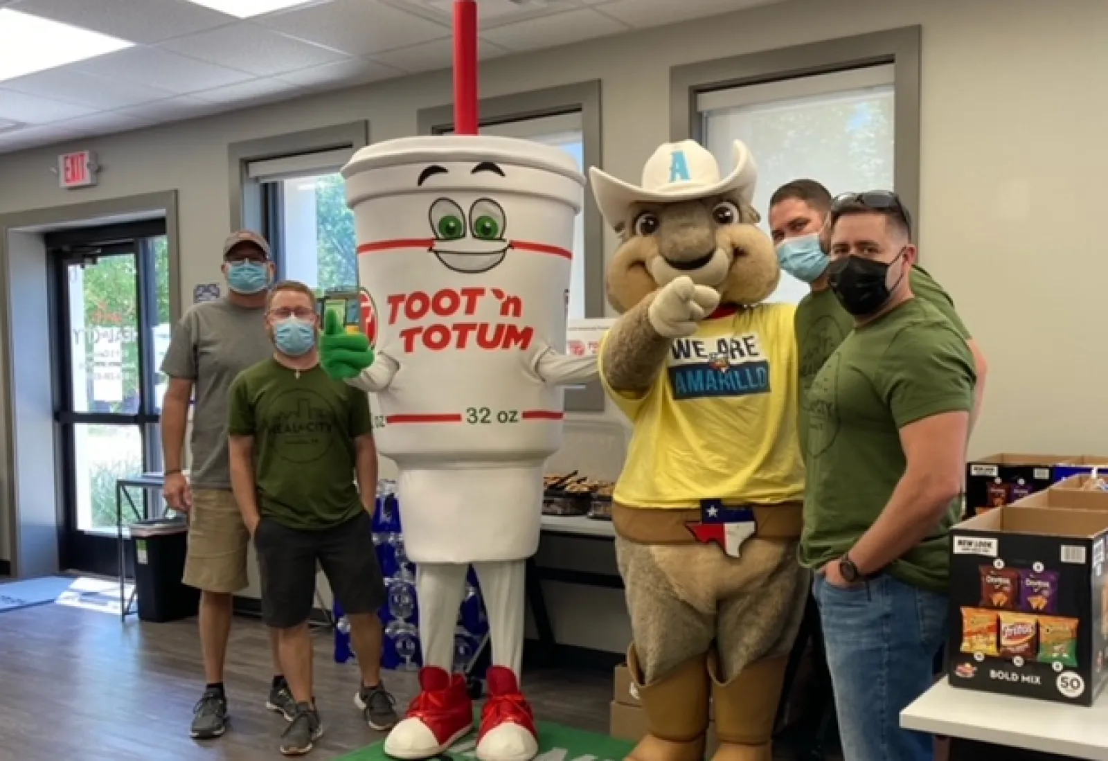 a group of people standing in a room