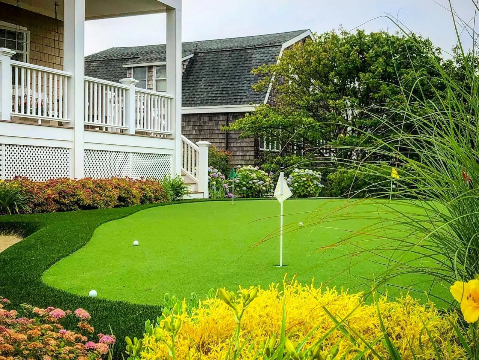 a golf course in front of a house
