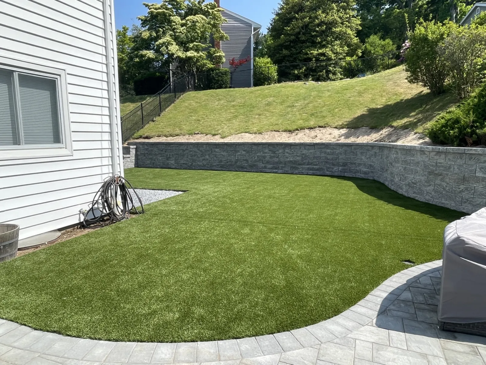 a backyard with a small lawn