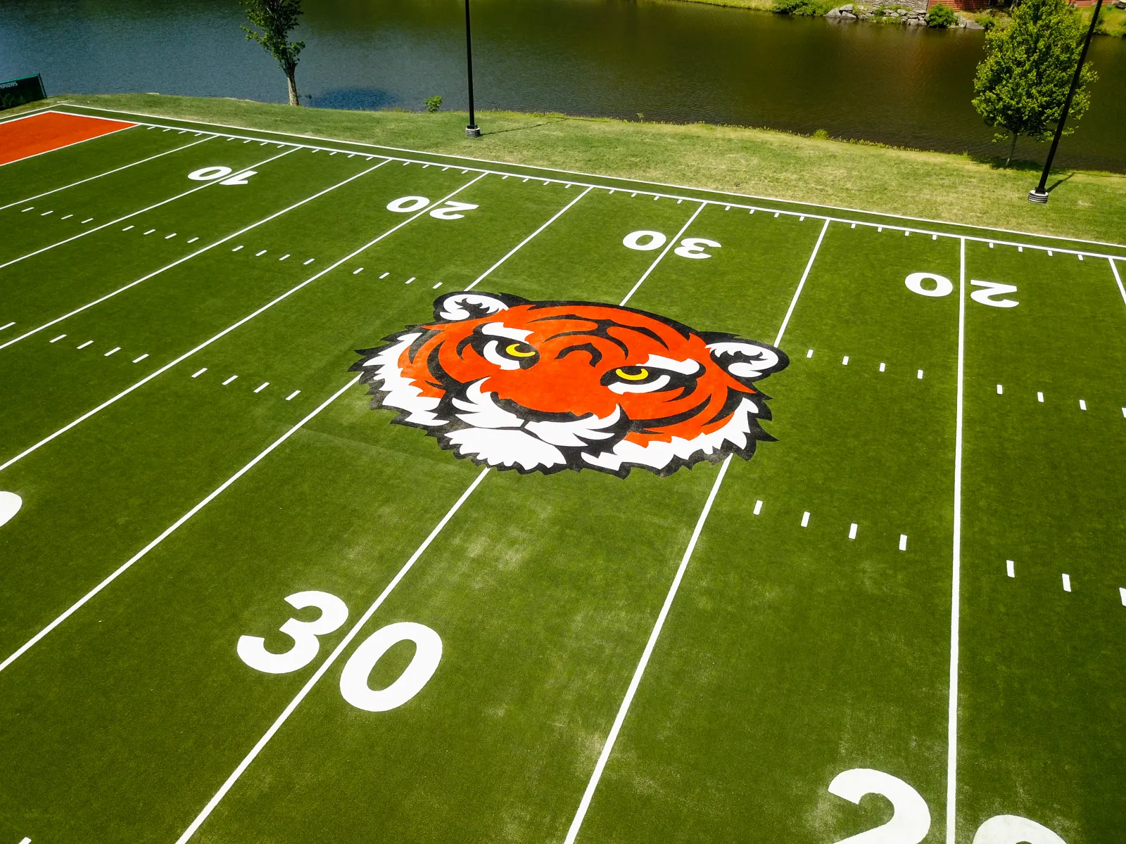 a football field with a logo