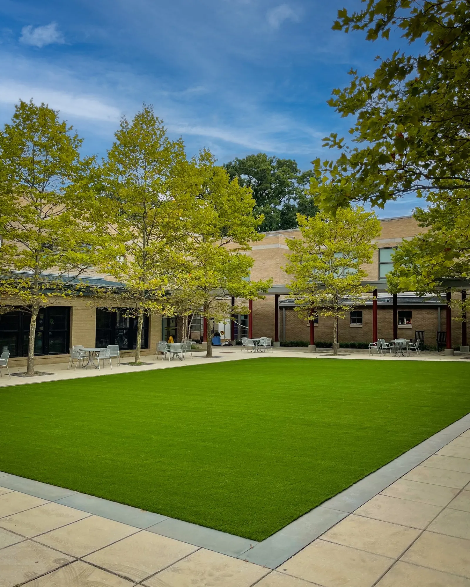 a building with trees in front