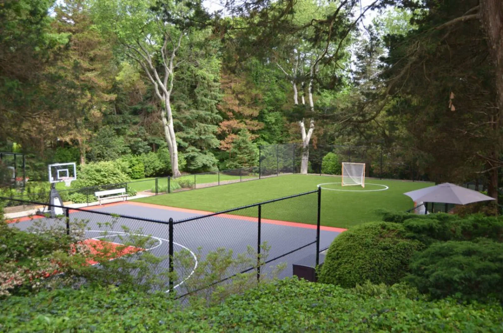a tennis court in a park