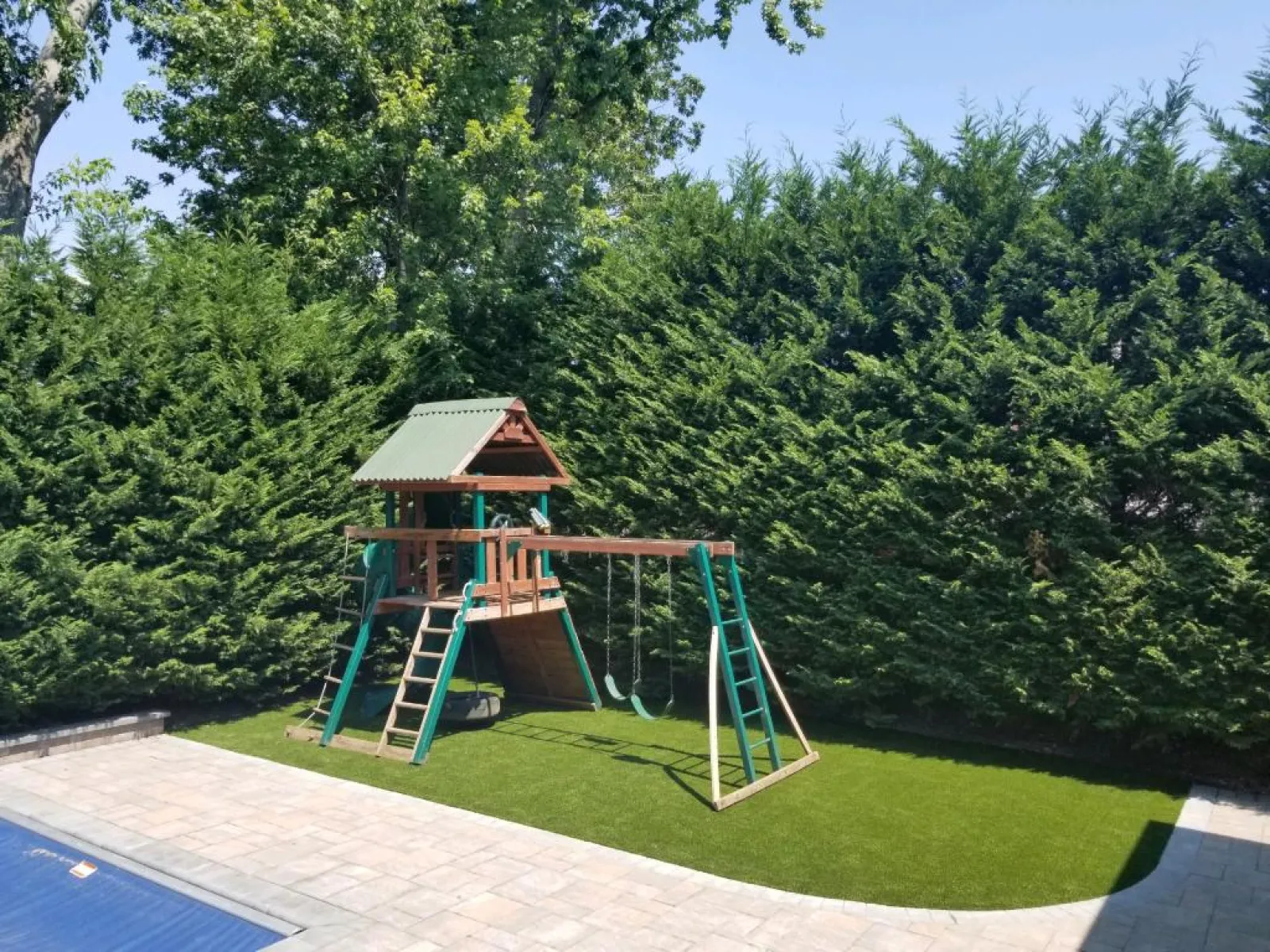 a play structure in a backyard