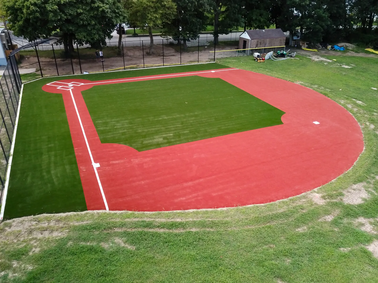 a football field with a red and white stripe