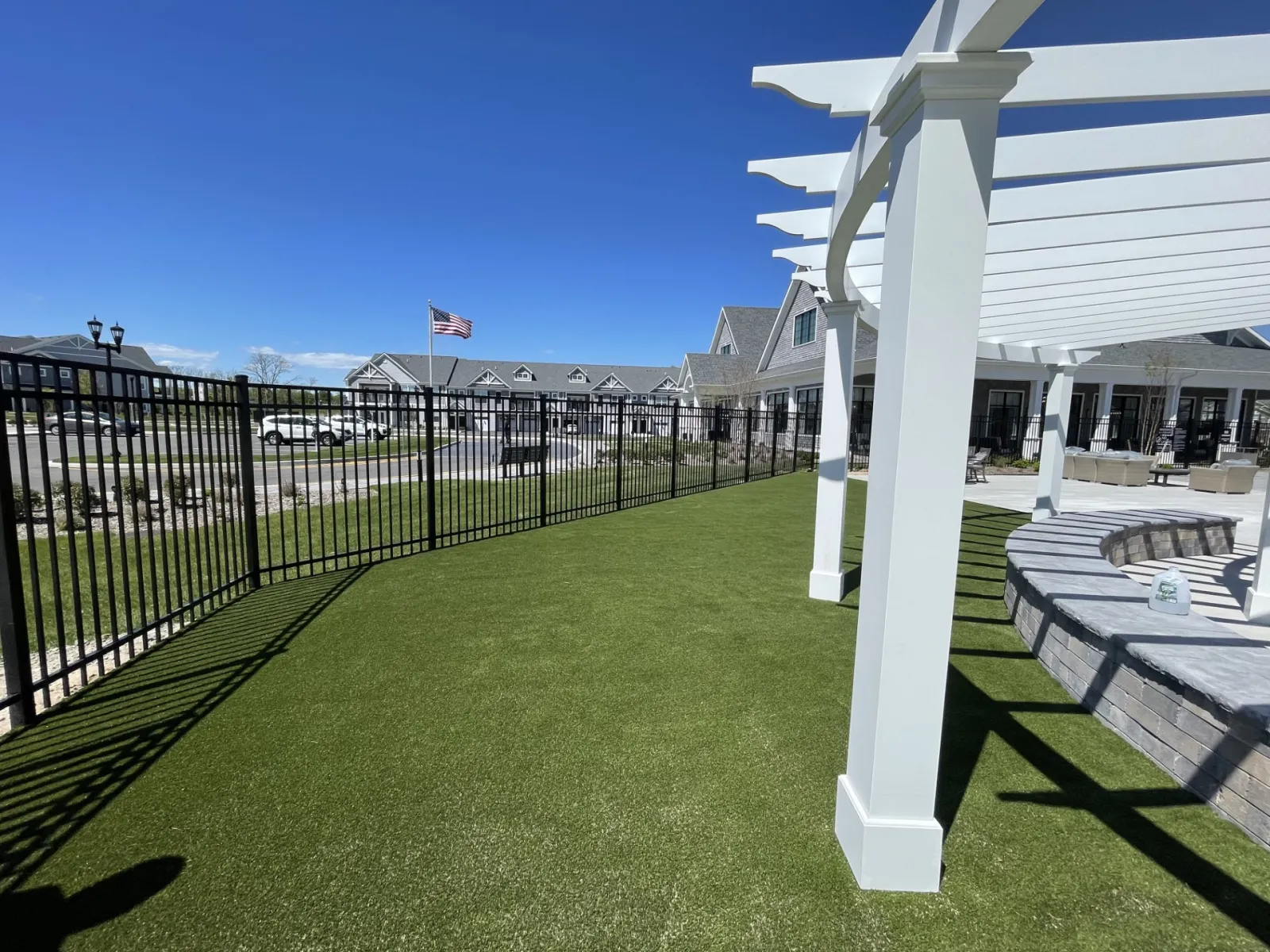 a large white gazebo in a grassy area