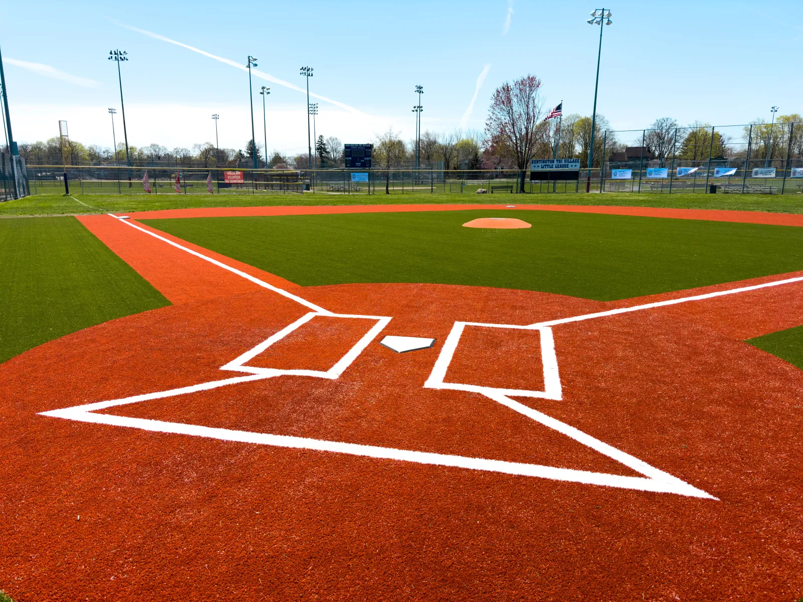 a baseball field with a red and white field