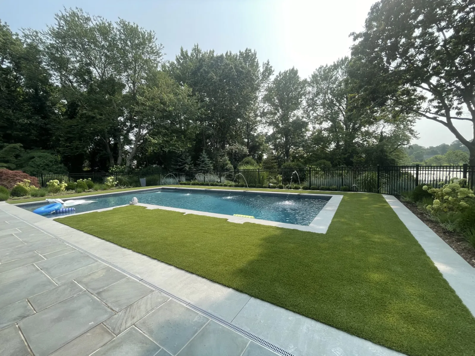 a swimming pool in a backyard