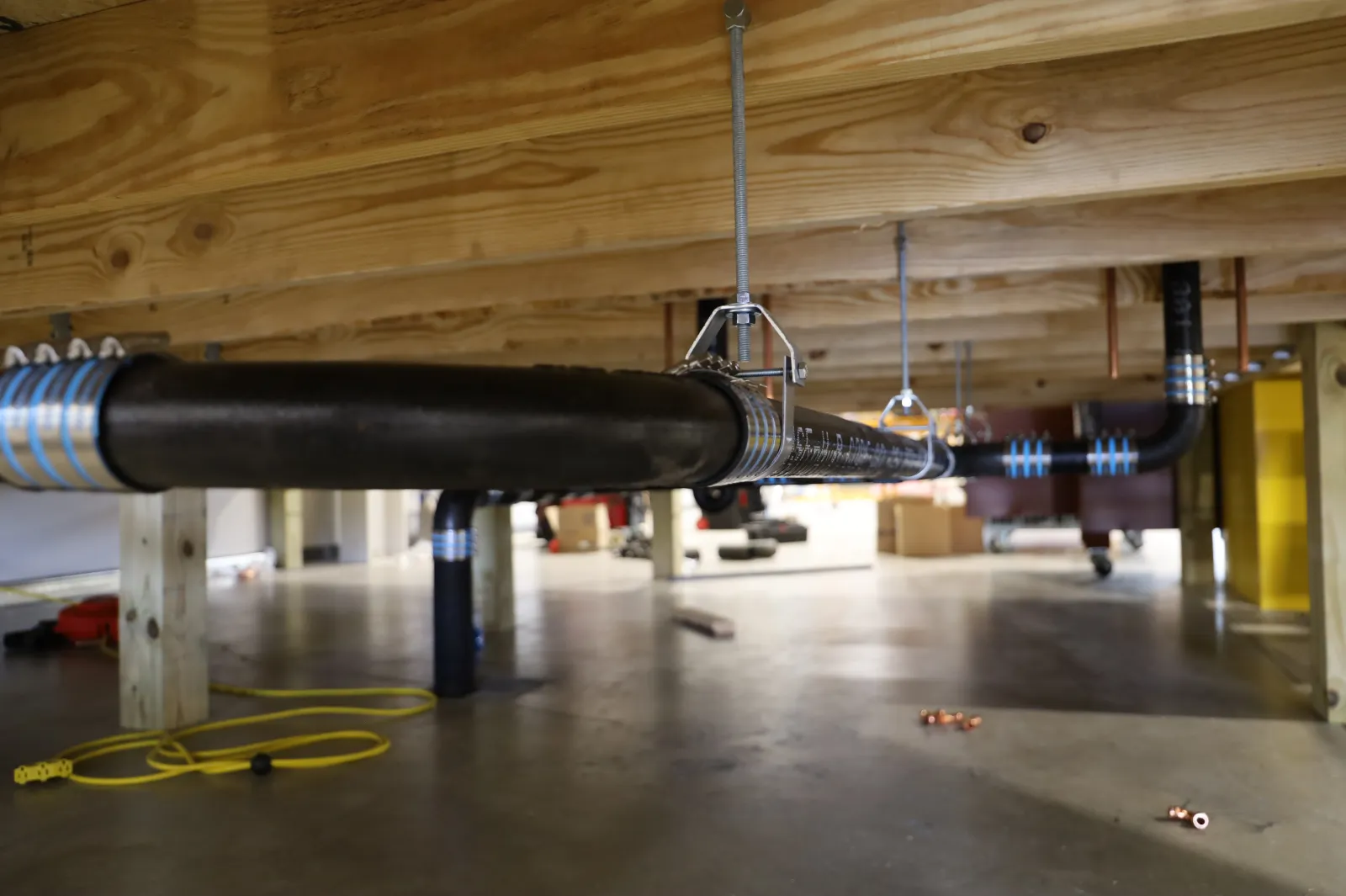 a large black pipe in a room