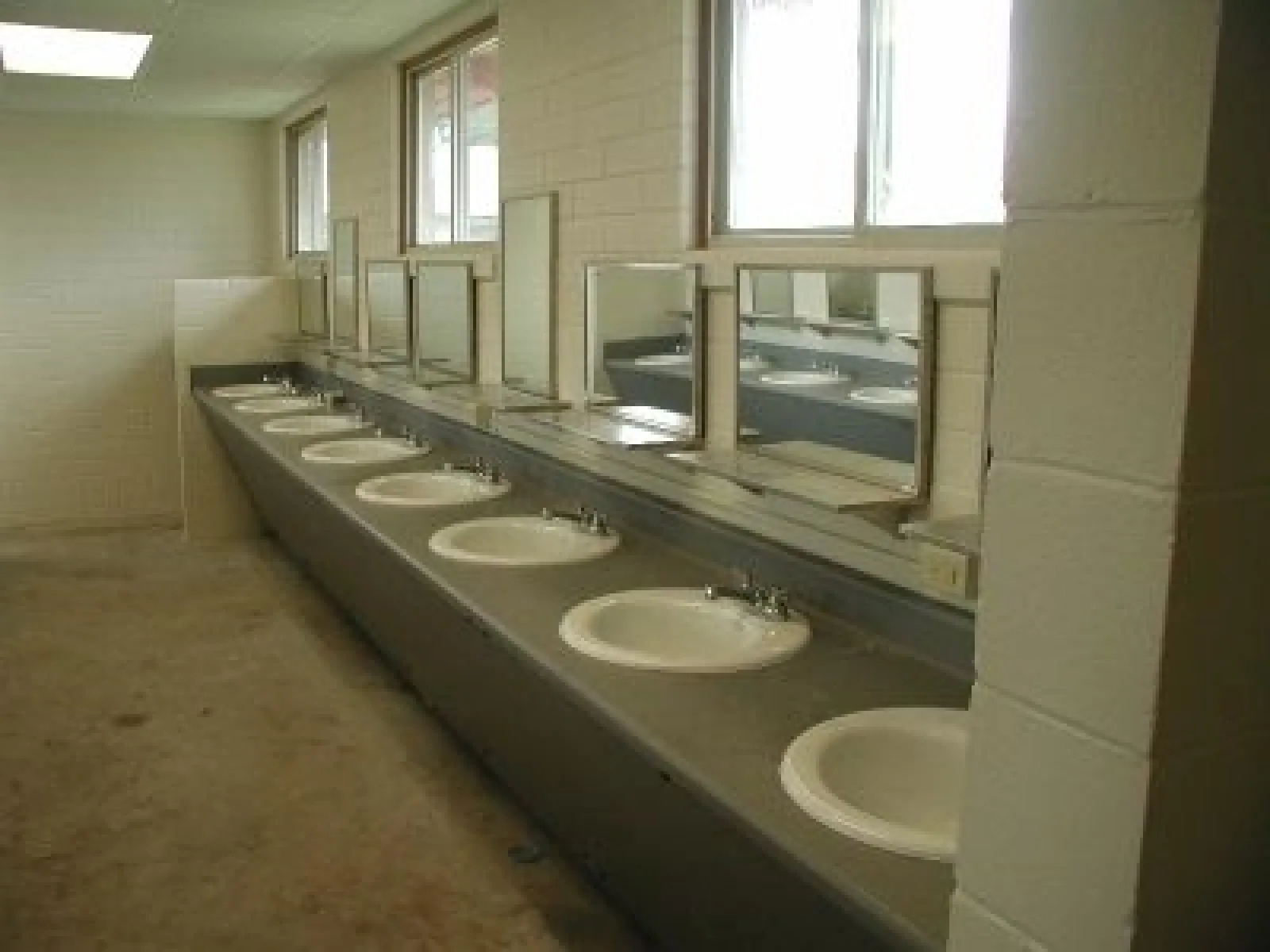 a bathroom with sinks