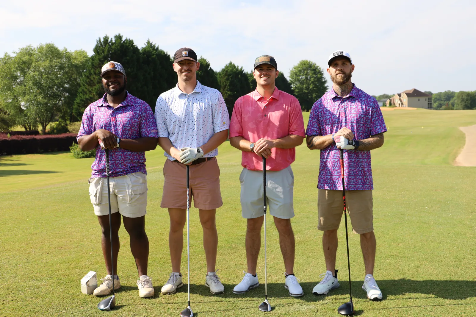 a group of men in golf uniforms