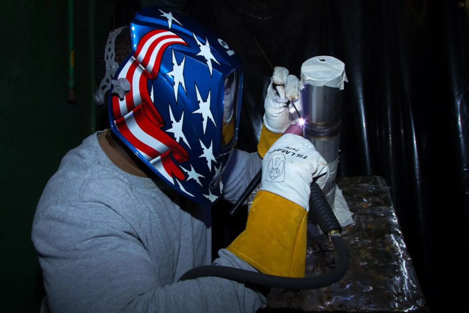 a person wearing a mask and gloves