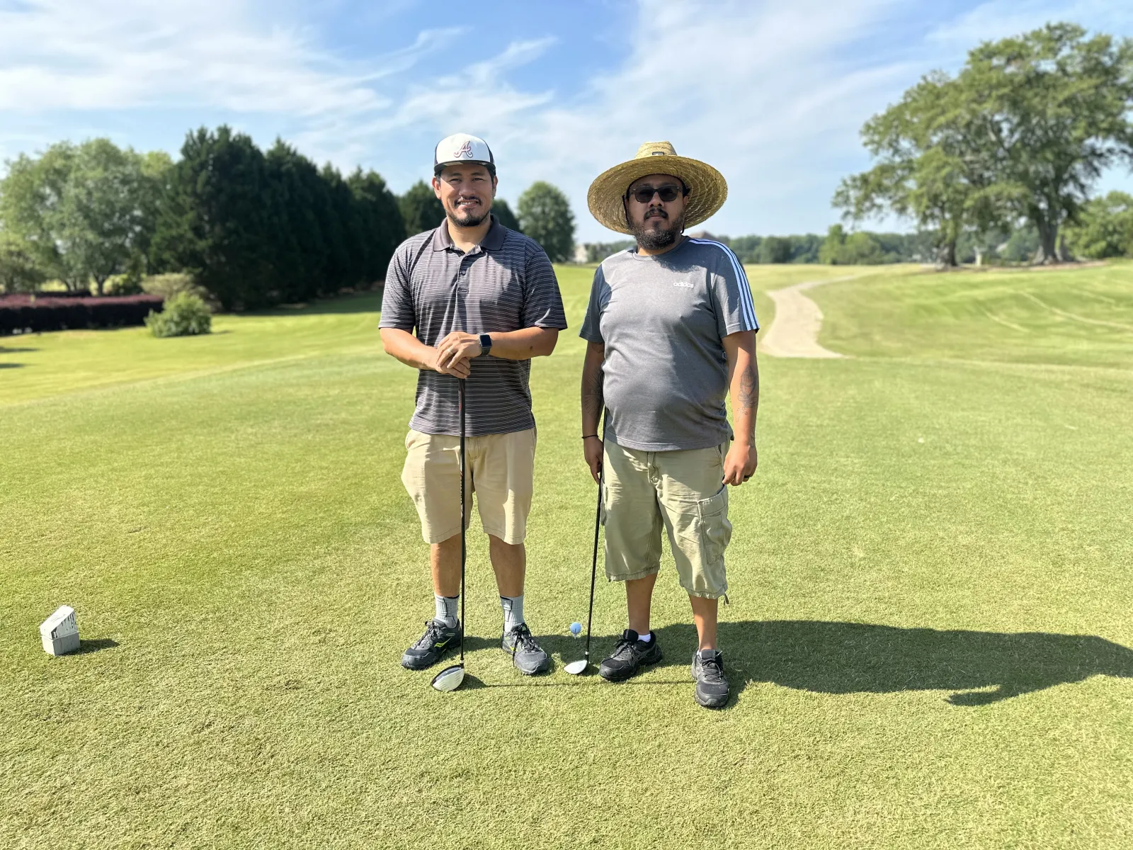 two men on a golf course