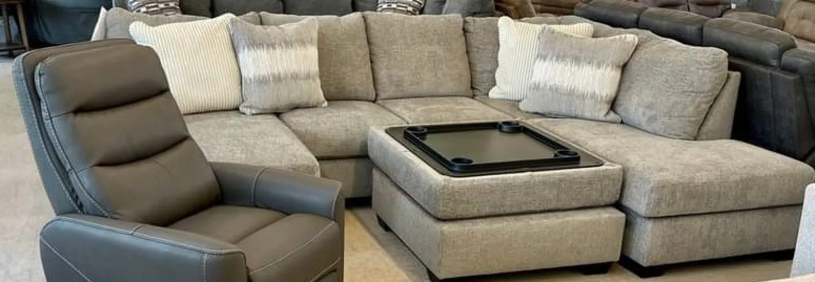 a couch with a laptop on it