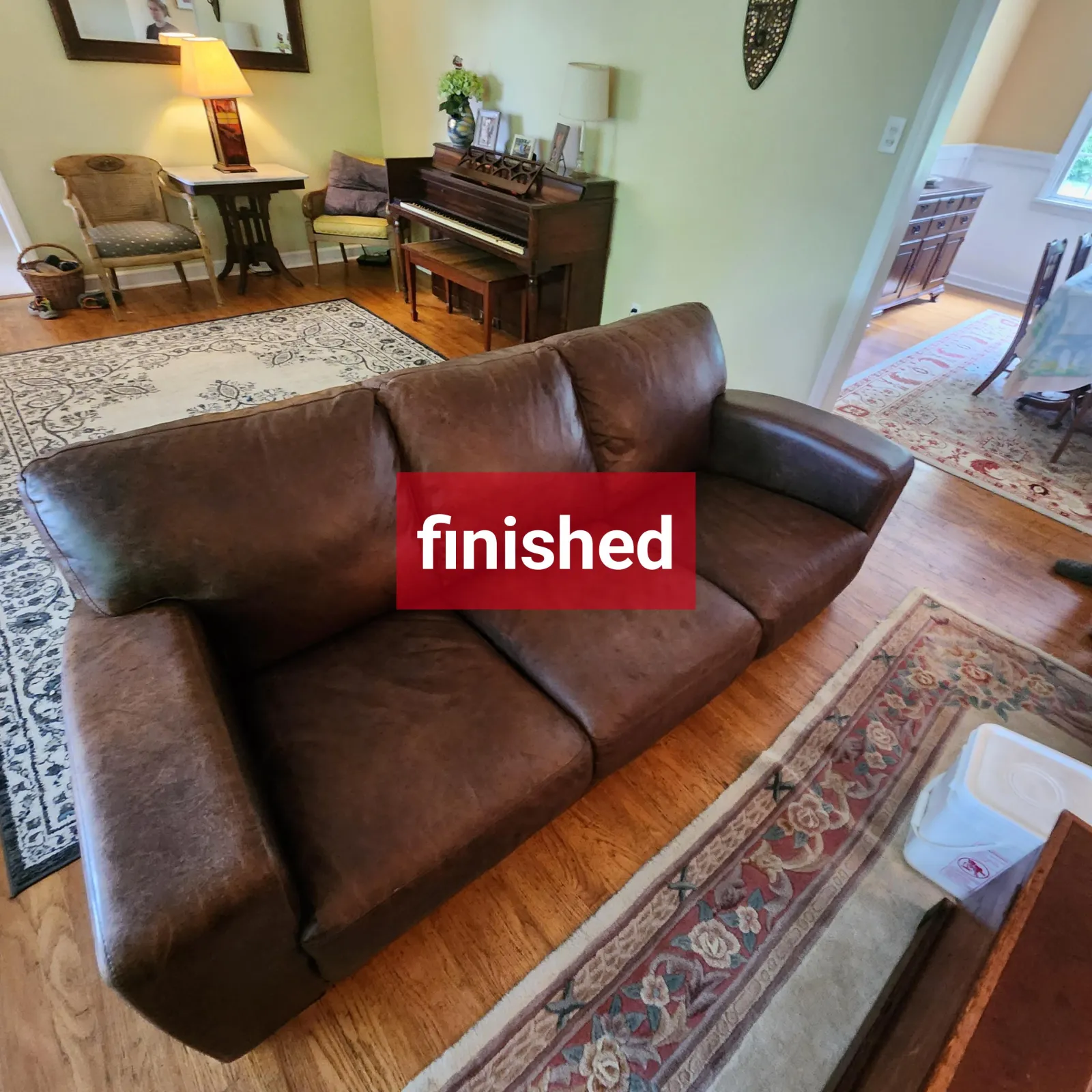 a professionally cleaned leather couch after it was professionally cleaned by Zerorez, in a real customer's home