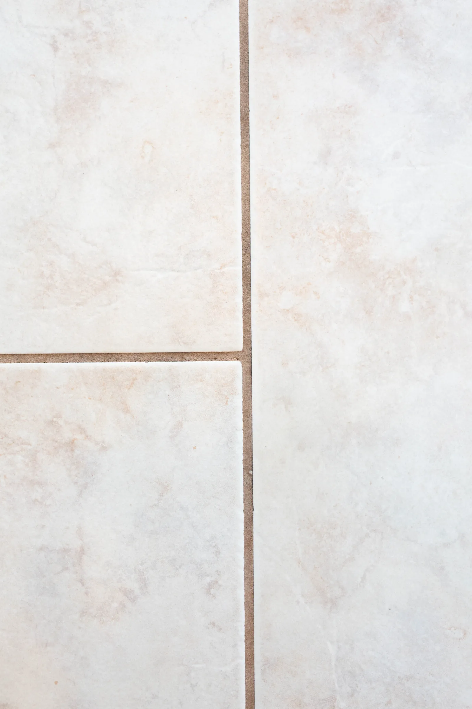 stained grout on white tile