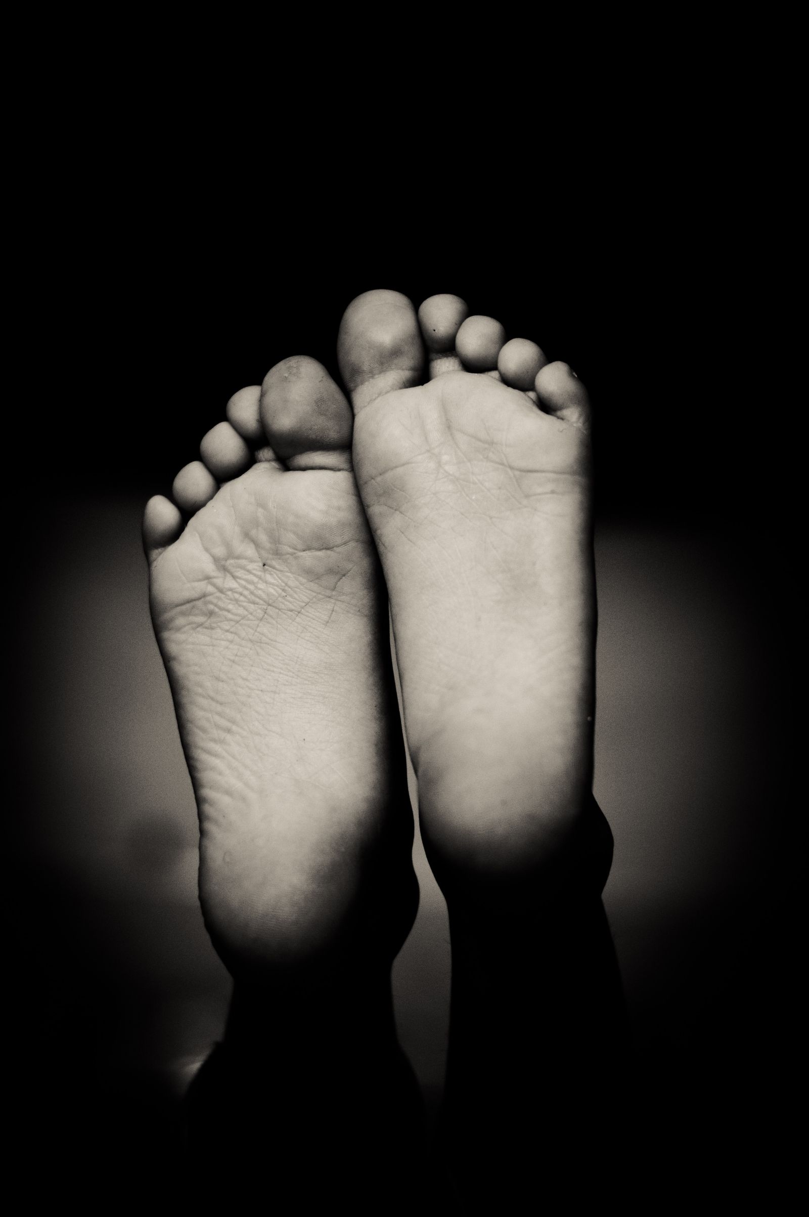 Close up of barefeet in black and white