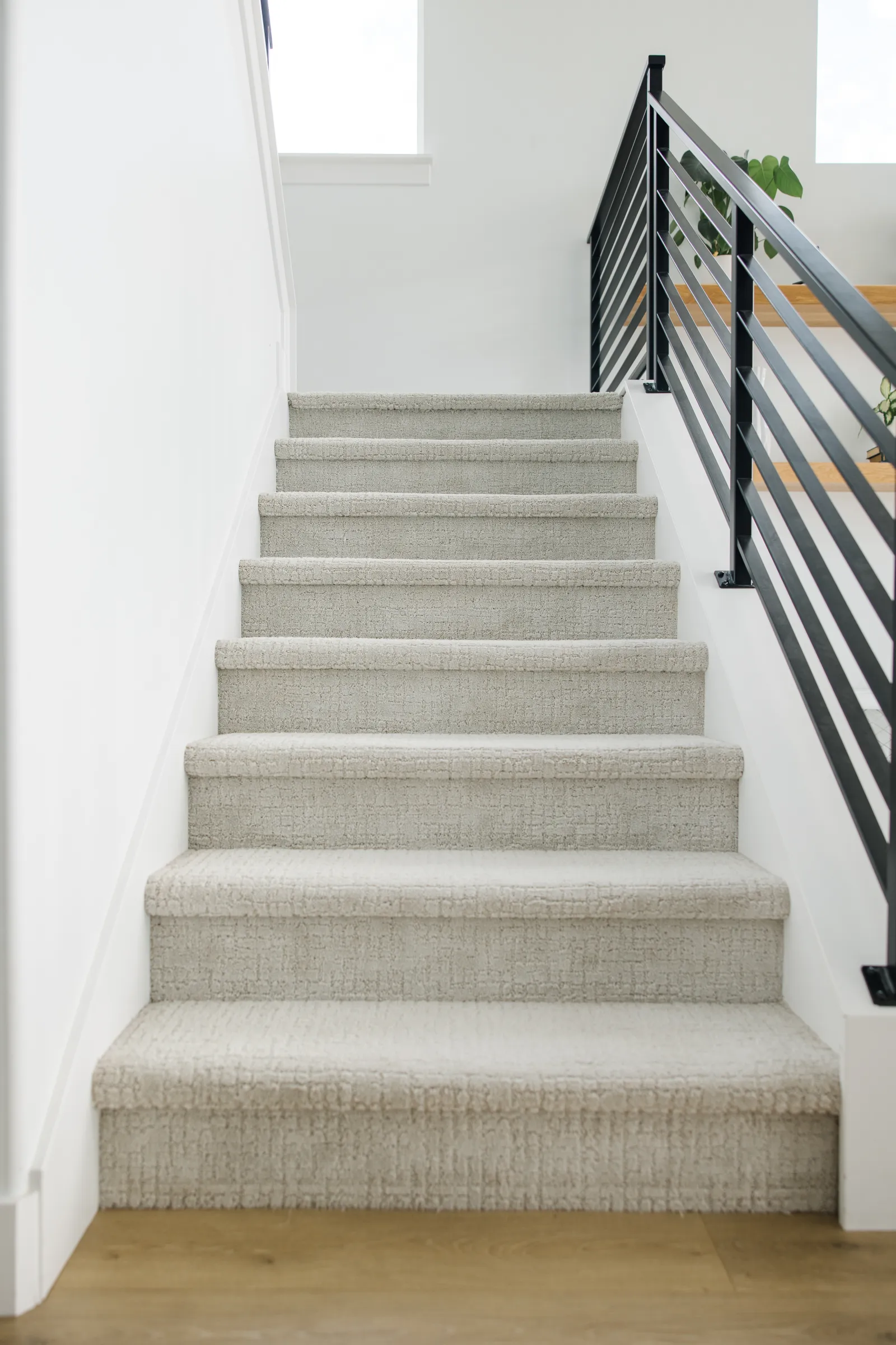 light gray beiege carpeted stairs to prevent slippery tile stairs