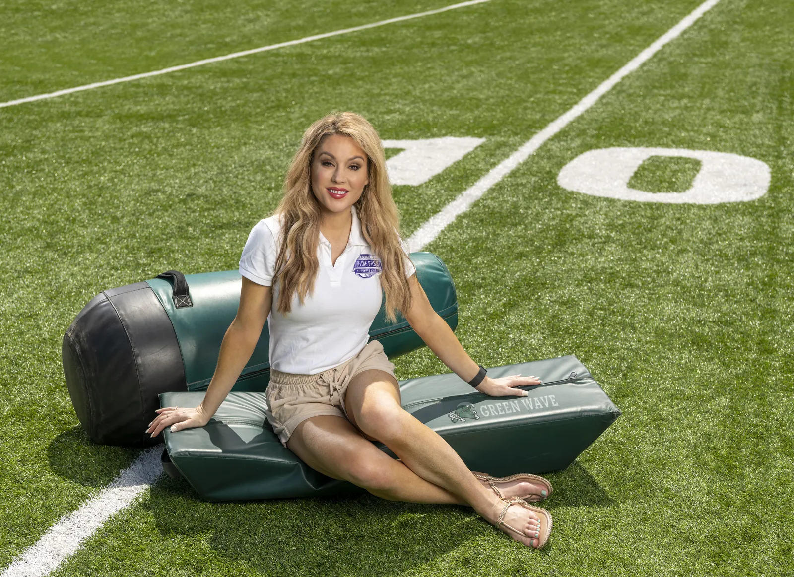 Fox Sports NFL sideline reporter Jen Hale prepares to go on the