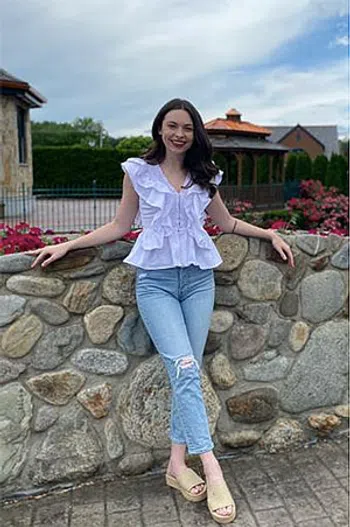 Young woman wearing a white
