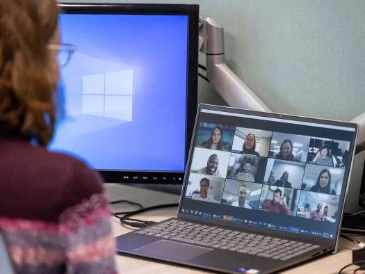 a person participating in a virtual meeting