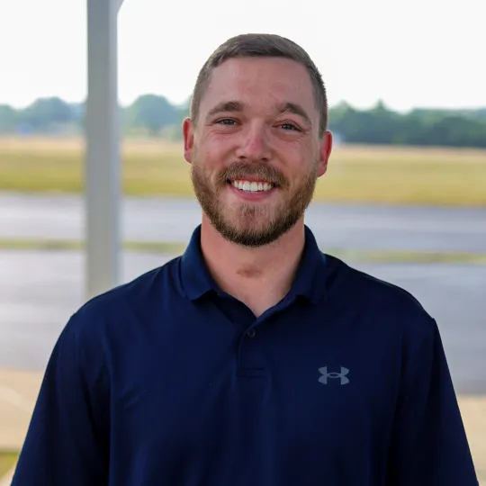a man smiling for the camera