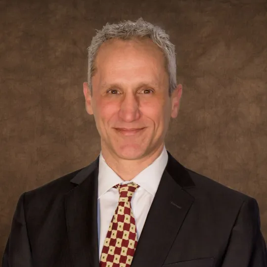 a man in a suit and tie