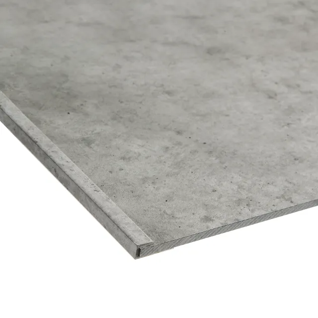 Close-up of gray textured laminate flooring panel with interlocking edge system for easy installation.