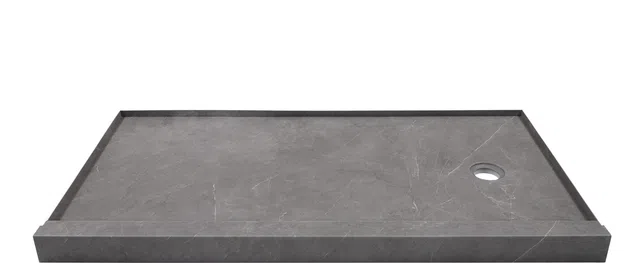 Rectangular gray stone shower base with raised edges and a round drain hole on one side.