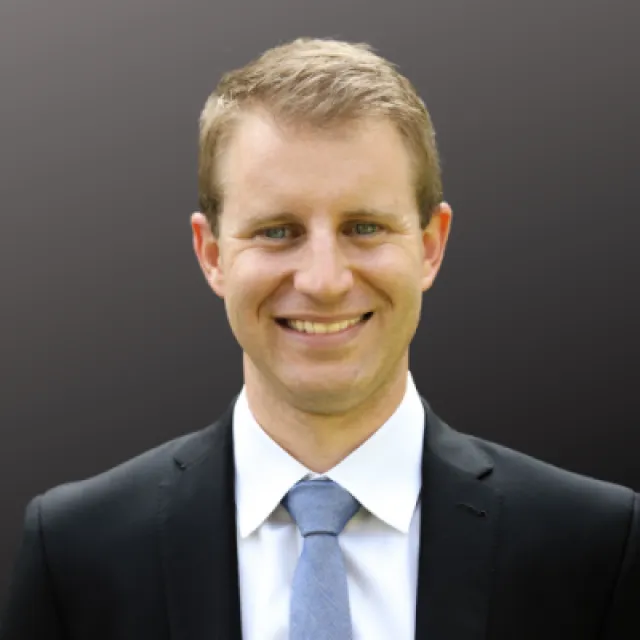 a man in a suit and tie