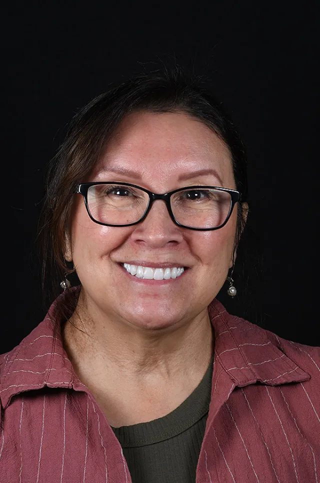 a woman wearing glasses