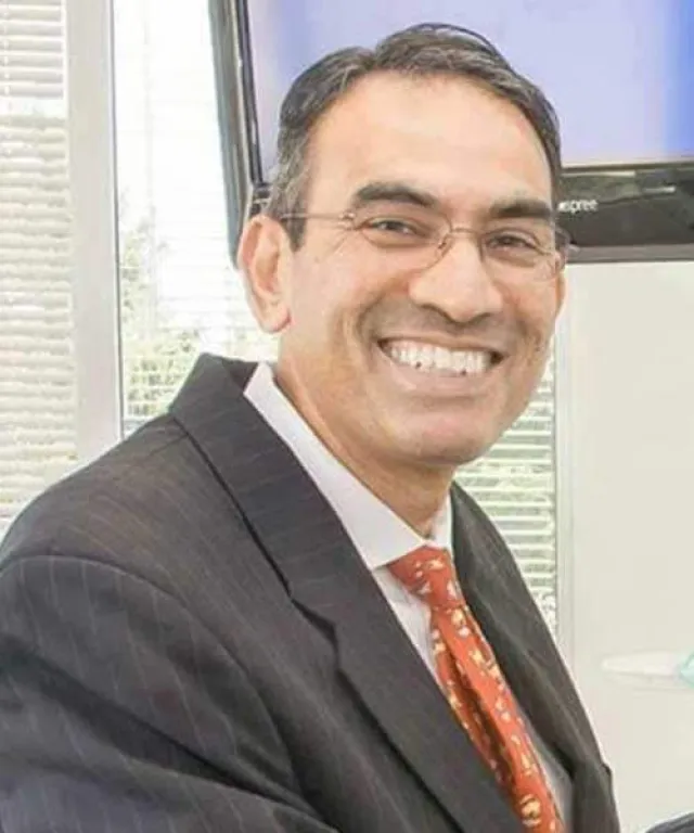 a man wearing a suit and tie
