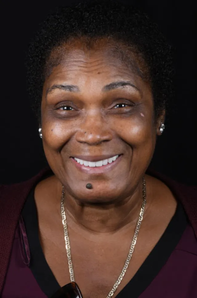 a woman with a necklace
