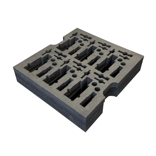 Black foam insert with multiple cutouts designed to hold tools or small components securely in place.