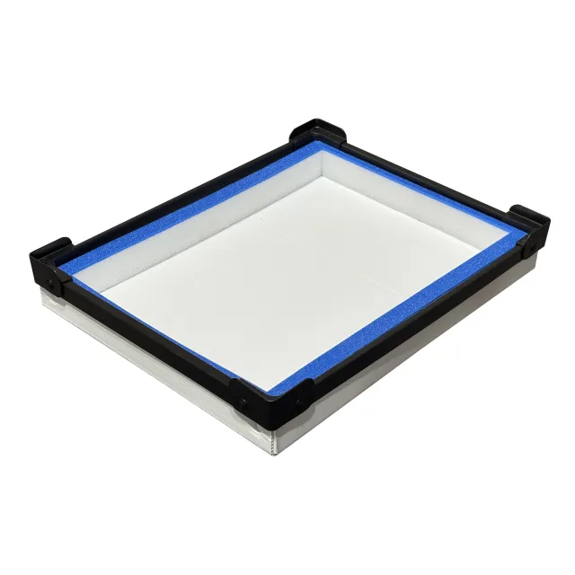 Rectangular protective case with blue foam lining and black corner supports on a white background