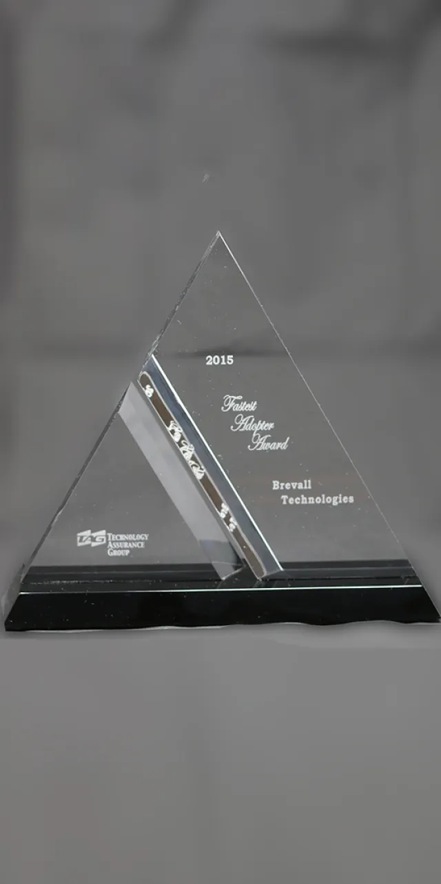2015 Brevail Technologies award in a distinctive pyramid shape, showcasing excellence in innovation.
