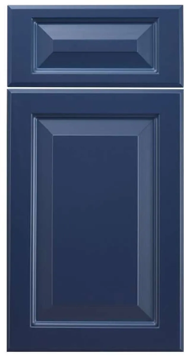 Dark blue raised panel cabinet door and drawer front with beveled edges and classic design.