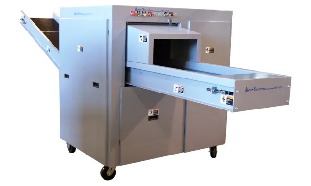 Industrial paper folding machine with conveyor belts and control panel on wheels for easy mobility.